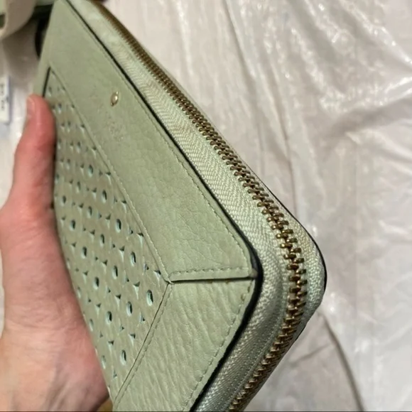 Kate spade green perforate eyelet lace leather zipper clutch wallet